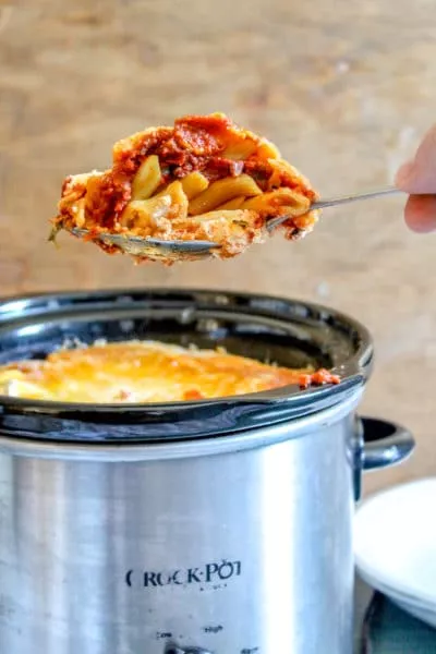 Super easy version of the Italian-American classic baked ziti, made in the crockpot or slow cooker! (You don't even boil the noodles first!)