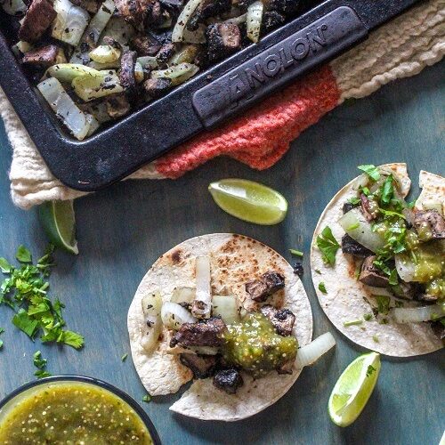 Sheet pan portobello tacos with a simple salsa verde made with cilantro, tomatillos, garlic and lime. Comes together in just 20 minutes!