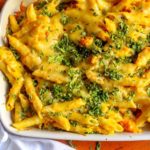 Creamy, cheesy, butternut squash baked ziti made with mashed butternut squash, white cheese sauce, topped with melted cheddar.