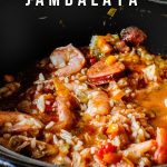 Slow cooker jambalaya with sausage, shrimp, green peppers, onions, seasonings, and instant rice. Instructions for using fresh rice included!