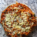 Spaghetti tossed with sweet Italian sausage and then bound with egg & cheese, baked in a pie- a fun way to change up weeknight dinner!