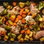 Creamy coconut sauce with tender bites of chicken, pineapple, carrots, and broccoli. This coconut chicken sheet pan meal freezes great, too!
