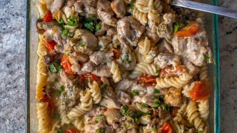 Toss dry rigatoni with tender chicken, zingy pesto, cherry tomatoes, mushrooms, and top it all with melty cheese. Easy weeknight pasta dinner!