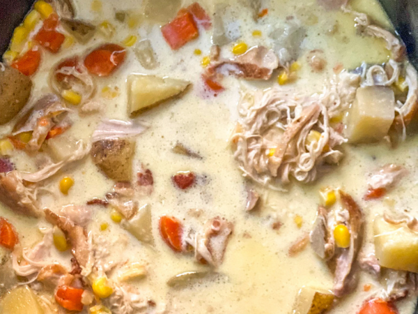This creamy chicken and corn chowder starts with seared chicken and bacon, building flavor from the get-go. Added cream for smoothness!
