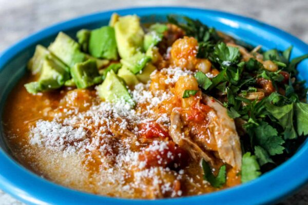 Stew simmered with tomatoes, chipotle, hominy and shredded pork shoulder. It’s a play on the classic New Mexican soup pozole.