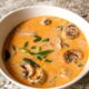Smooth coconut and Thai curry soup with chicken and mushroom. Makes a great make-ahead soup recipe for working from home lunch!