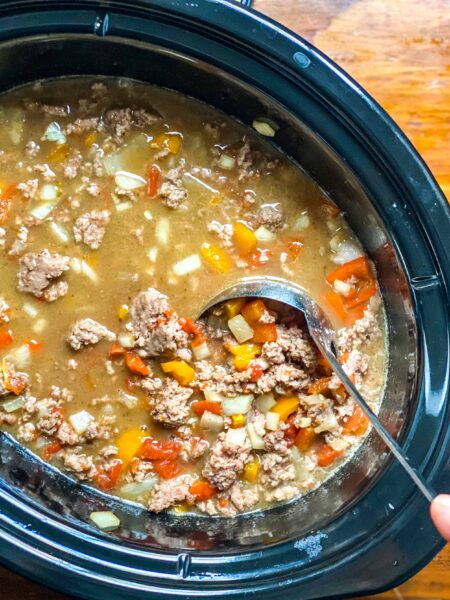 Slow cooker stuffed pepper soup made with ground beef, diced tomatoes, and a bit of brown sugar to minic the caramelized flavor of roasted peppers! 